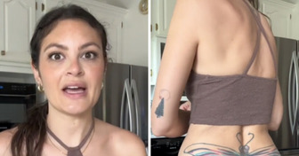 Une femme montre son tatouage embarrassant pour mettre en garde les amateurs de tatouages